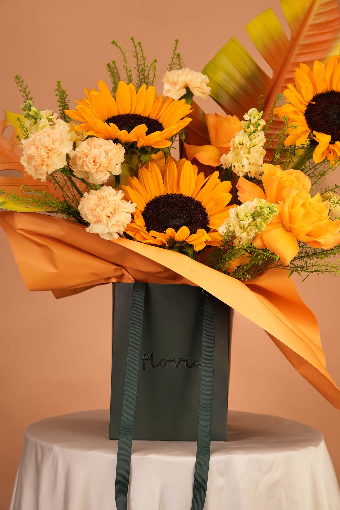 Golden Hour - Sunflower & Tropical Leaf Bag Arrangement