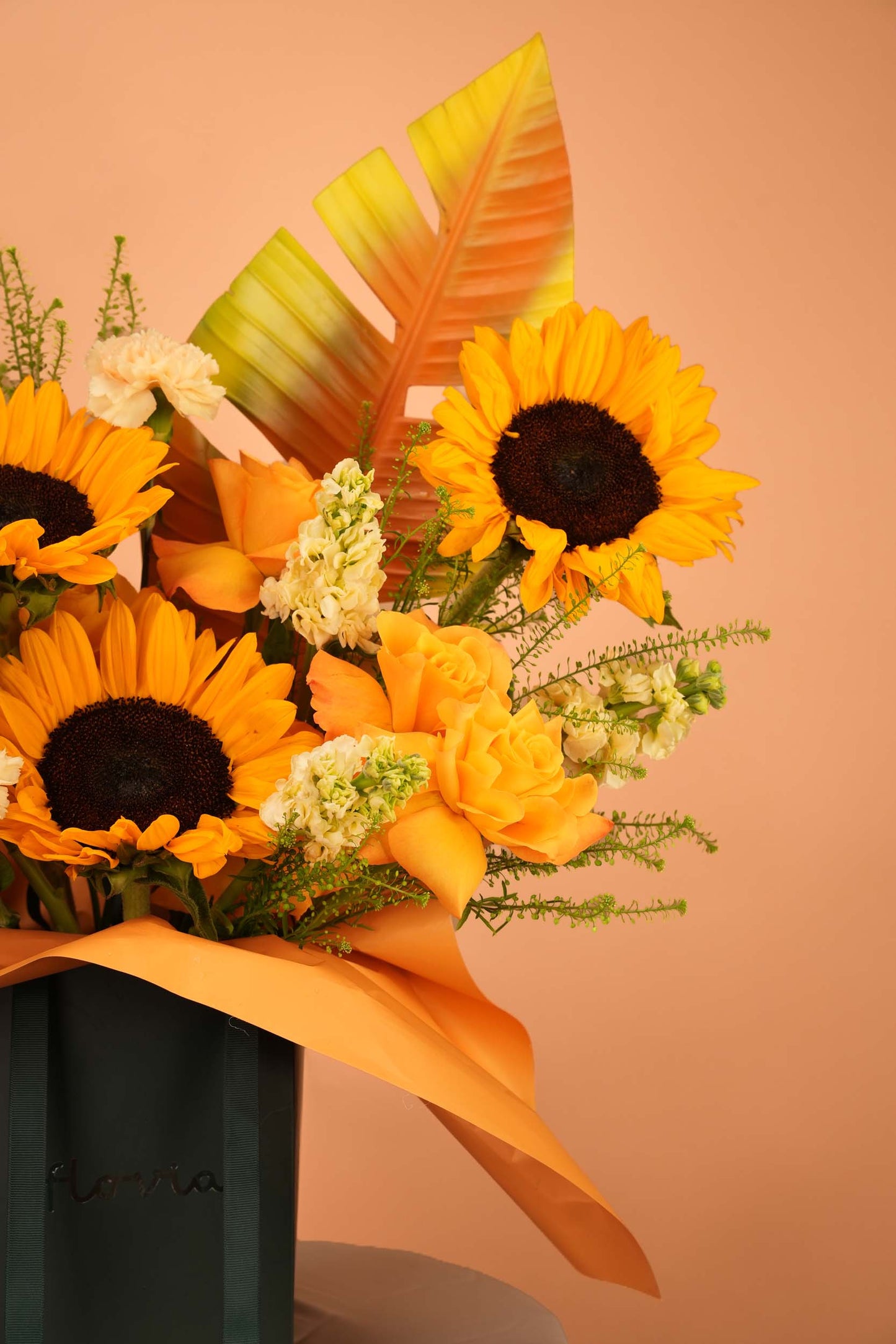 Golden Hour - Sunflower & Tropical Leaf Bag Arrangement