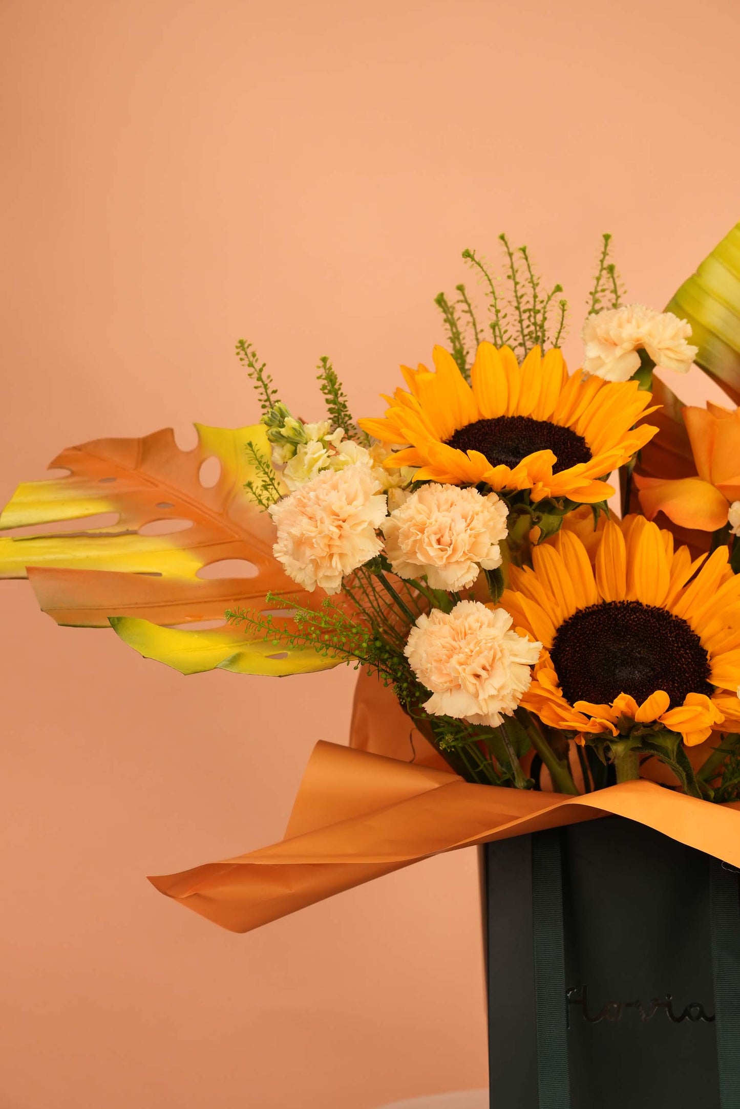 Golden Hour - Sunflower & Tropical Leaf Bag Arrangement