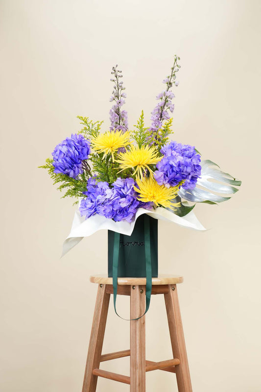 Violet Radiance Luxe Bag Arrangement